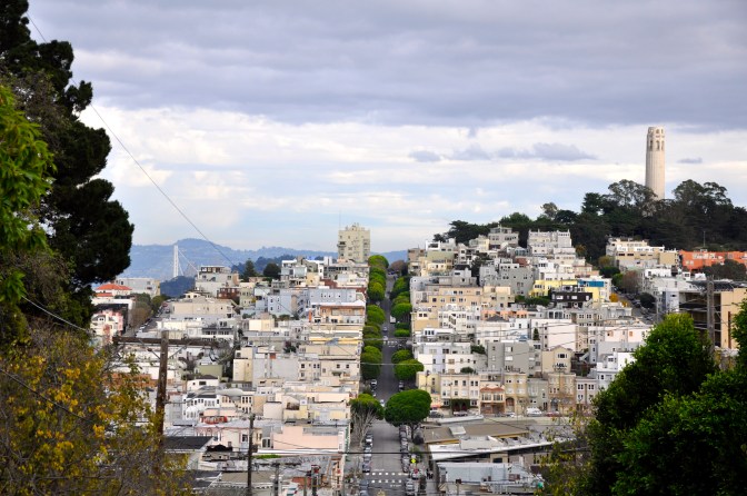 San Francisco as seen from the top of Lombard Street, Coit Tower on the right, Bay Bridge over to Oakland on the left.